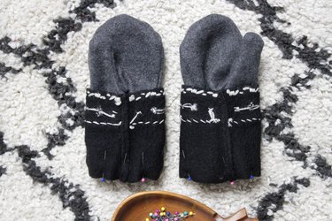 Take an old flannel shirt that's been hanging around the thrift store or maybe even a loved ones old shirt to create some mittens.