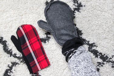 Take an old flannel shirt that's been hanging around the thrift store or maybe even a loved ones old shirt to create some mittens.