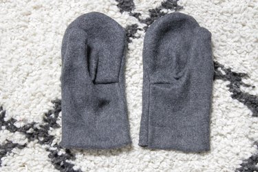 Take an old flannel shirt that's been hanging around the thrift store or maybe even a loved ones old shirt to create some mittens.