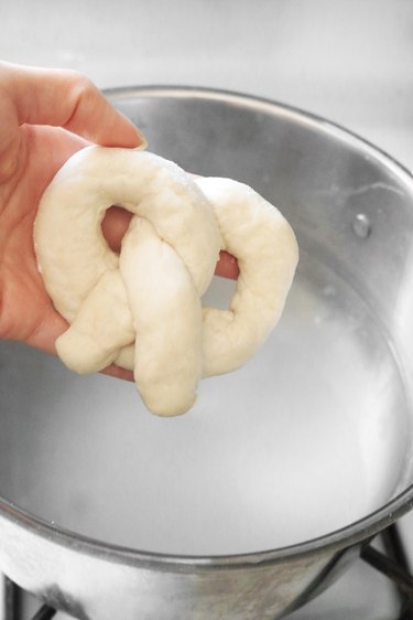 Drop pretzels in baking soda bath