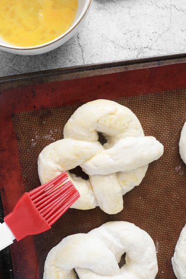 Brush pretzels with egg wash