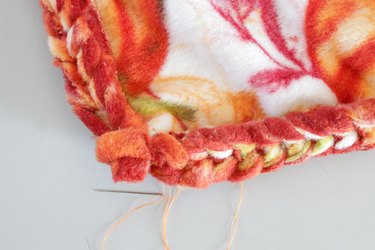 This soft and delicate DIY throw is just right for snuggling up on the couch or or adding a touch of warmth to your bed.