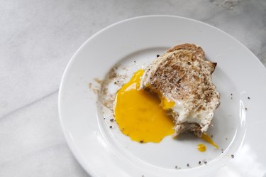 Toast and runny egg yolk breakfast