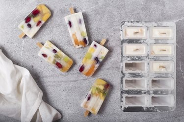 Homemade fruits and yogurt popsicles