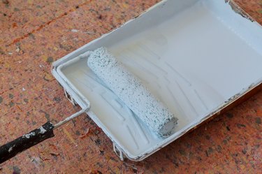 Paint Roller In Tray On Floor