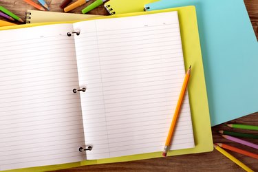 Student's desk with yellow project folder