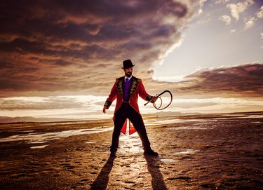 Circus Ring Master in a Dramatic Desert Setting