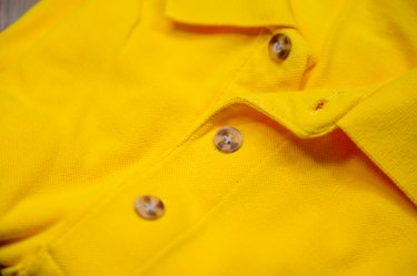 Close up view yellow polo shirt