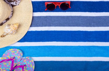 Beach accessories on towel