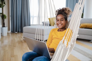 Young girl relaxing in the living room