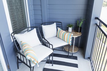 Two chairs on a cozy balcony