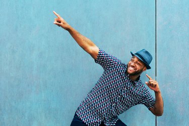 Man doing a fun pointing gesture