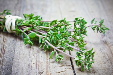 thyme on wooden table