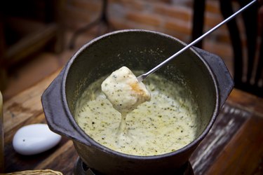 Fondue with herbs and white wine