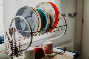 plates on drying board at the kitchen