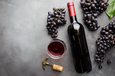 Red wine and ripe grapes