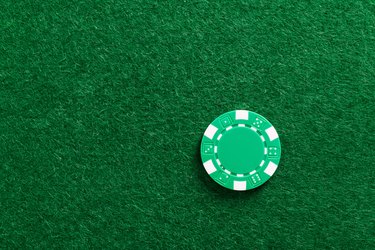 Single gambling chip on the table