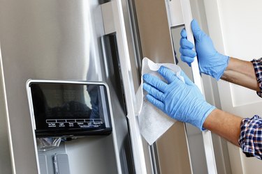 Cleaning refrigerator with wipe