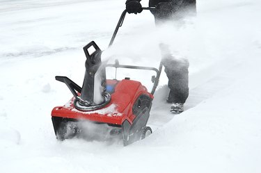 Man Using Snow Blower After a Snowstorm in Pennsylvania