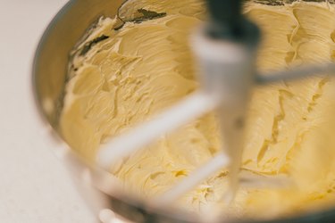 Closeup of creamed butter in a stand mixer bowl