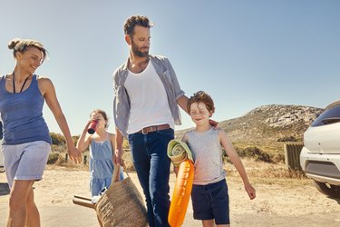 A family on their way to the beach