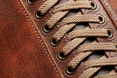 Shoe lace on brown leather