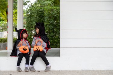 Children in costumes going to trick or treat