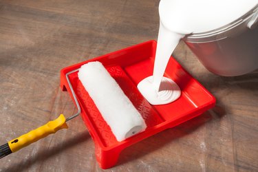 Pouring Paint In an Empty Paint Tray