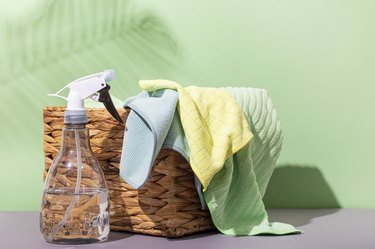 Microfiber cloths for cleaning and a spray bottle with clean water: tools for eco-friendly cleaning without household chemicals