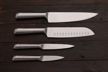 Four  stainless steel kitchen knives