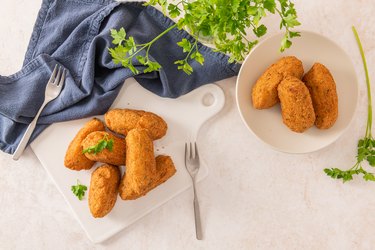 Bolinhos de bacalhau, very famous in Portuguese gastronomy. Fried dumpling, cod dumpling, fish meat, salted cod fritters, bacalao bunuelos.