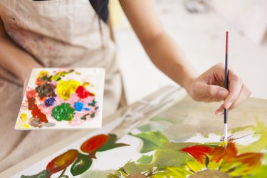 Female artist working in studio