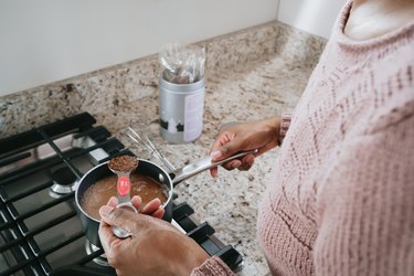 Woman Makes Hot Chocolate on Cooktop