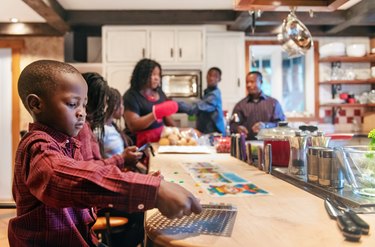 African-American preparing thanksgiving dinner