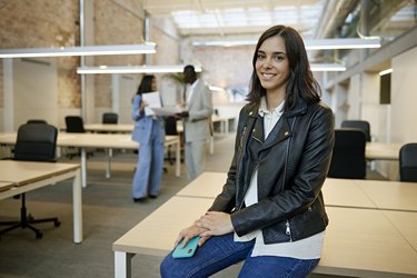 Indoor Portrait of Casual Mid Adult Woman in Modern Office