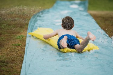 Carefree Child on a Slip 'n' Slide