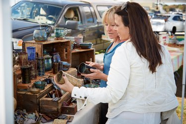 two friends shopping pottery