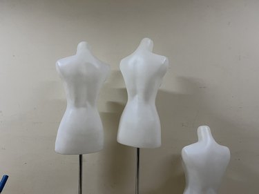 mannequin on a clean white wall storage