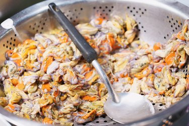 Close-up of Fresh sea mussels without shell, thai street food market