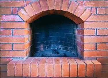 red stone brick fireplace outdoor firebox black burnt