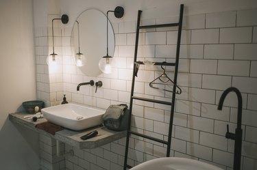 Bathroom with hanging vanity lights