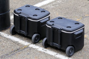 Two large coolers on wheels