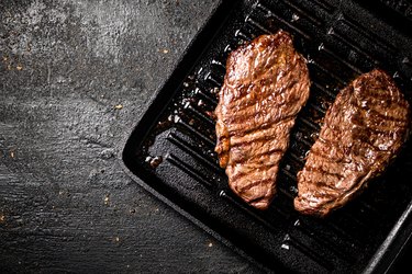 Two steaks on a grill pan