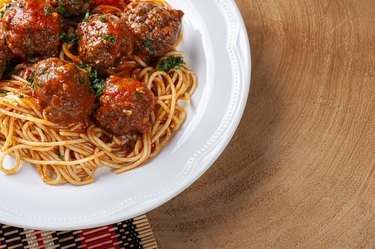 Meatballs with tomato sauce and pasta. Top view  - Almondegas.