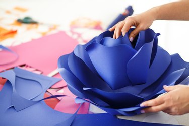 Piecing together a big paper flower