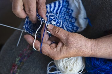 Senior woman knitting