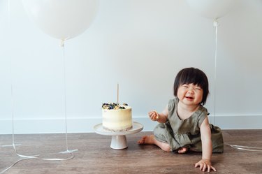 Cute Asian toddler’s first birthday