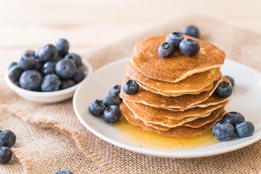 Close-up of pancakes in plate on table