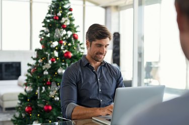 Businessman working during christmas time