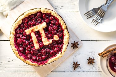 Cherry pie celebrating Pi Day with pi symbol